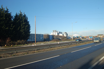 The site of the Dun Cow Beerhouse lies approximately at the unused advertising hoardings centre of shot